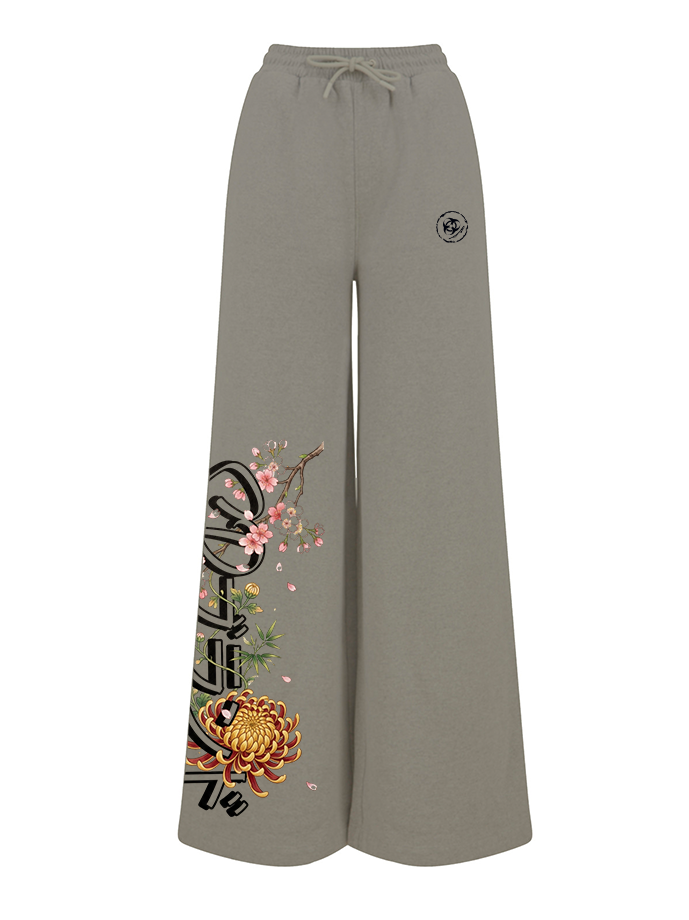 Khaki sweatpants with floral and graphic design on a white background